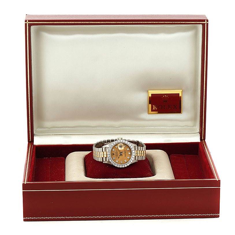 The Rolex President 69179B Women's White Gold Brown Dial 69179B Women's White Gold Brown Dial model watch is shown inside its open presentation box, displaying the face and bracelet.