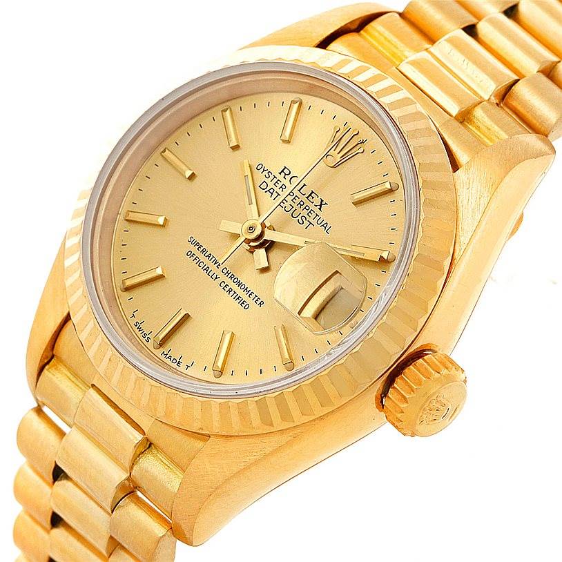 The image shows a close-up, angled view of a Rolex President 69178 Women's Yellow Gold Champagne Dial 69178 Women's Yellow Gold Champagne Dial model watch, highlighting its gold case, bracelet, and dial.