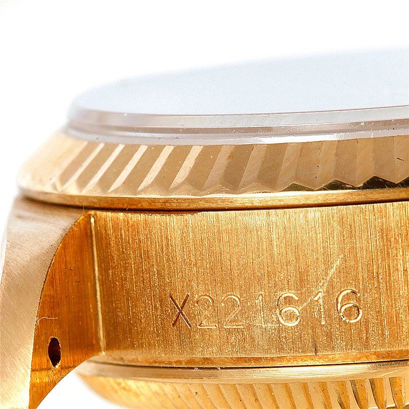This image shows a close-up angle of the case and part of the bezel on a Rolex President 69178 Women's Yellow Gold Champagne Dial 69178 Women's Yellow Gold Champagne Dial model watch.