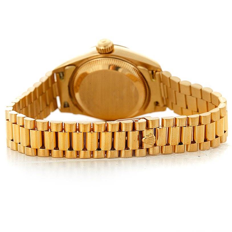 This image shows the back case and bracelet of a Rolex President 69178 Women's Yellow Gold Champagne Dial 69178 Women's Yellow Gold Champagne Dial model watch from a rear angle.