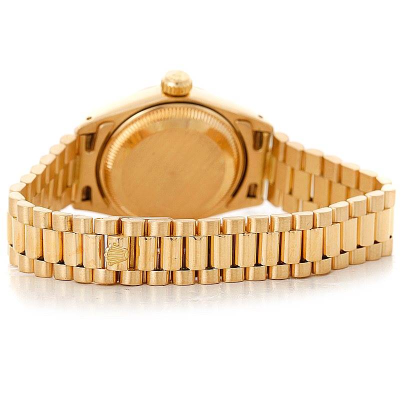 This image shows the back case and bracelet of the Rolex President 6917 Women's Yellow Gold Brown Dial 6917 Women's Yellow Gold Brown Dial model watch from a rear angle.