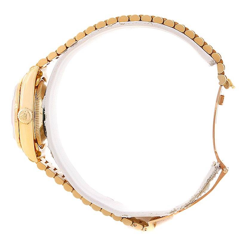 The side view showcases the band, crown, and a portion of the case of the Rolex President 69158 Women's Yellow Gold Champagne Dial 69158 Women's Yellow Gold Champagne Dial watch.