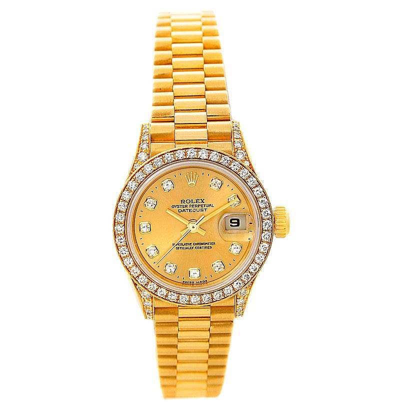 This image shows a Rolex President 69158 Women's Yellow Gold Champagne Dial 69158 Women's Yellow Gold Champagne Dial model watch from a top-down angle, displaying the face, bezel, and bracelet.