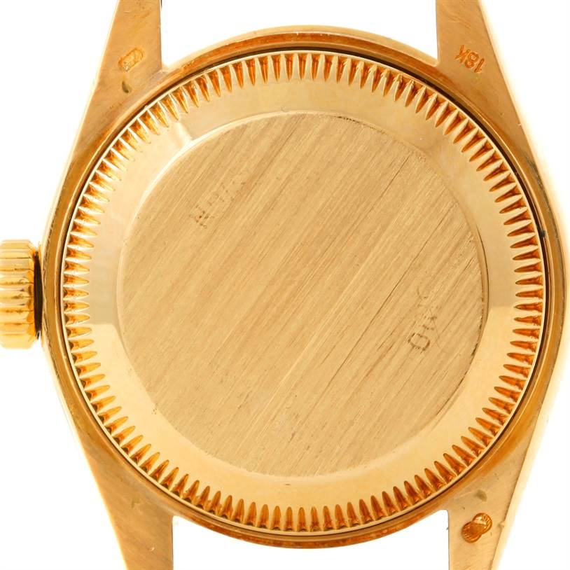 This image shows the back case of the Rolex President 69178 Women's Yellow Gold Champagne Dial 69178 Women's Yellow Gold Champagne Dial model watch, featuring the crown and lugs.