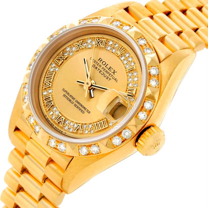 The image shows a close-up angle of a gold Rolex President 69178 Women's Yellow Gold Champagne Dial 69178 Women's Yellow Gold Champagne Dial model watch, highlighting the face, bezel, and part of the bracelet.