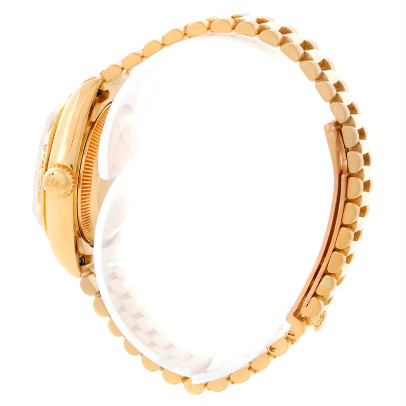 The image shows a side profile of a gold Rolex President 69178 Women's Yellow Gold Champagne Dial 69178 Women's Yellow Gold Champagne Dial model, highlighting the case, crown, and bracelet.