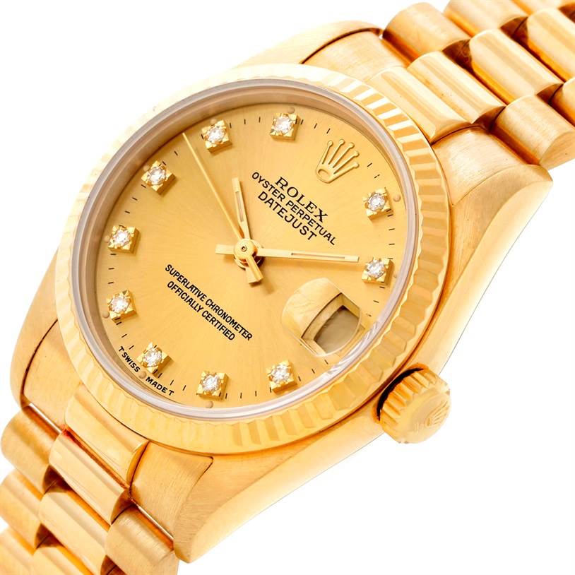 This image shows the Rolex President 68278 Women's Yellow Gold Champagne Dial 68278 Women's Yellow Gold Champagne Dial model watch at an angled view, highlighting the gold case, dial, bracelet, and crown.