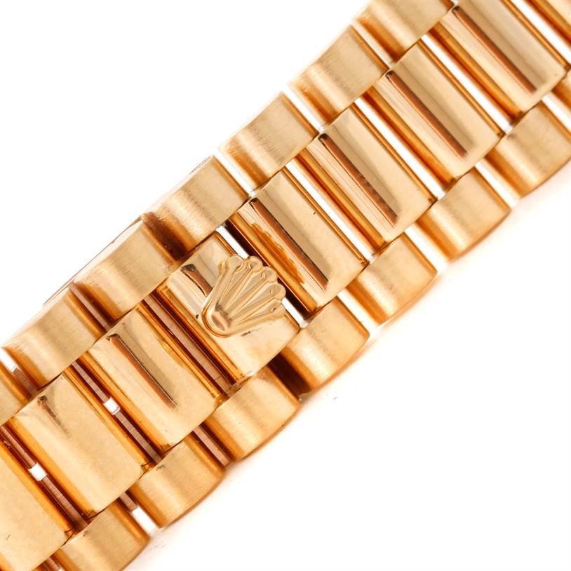This image shows a close-up of the bracelet and clasp of the Rolex President 68278 Women's Yellow Gold Champagne Dial 68278 Women's Yellow Gold Champagne Dial model watch.