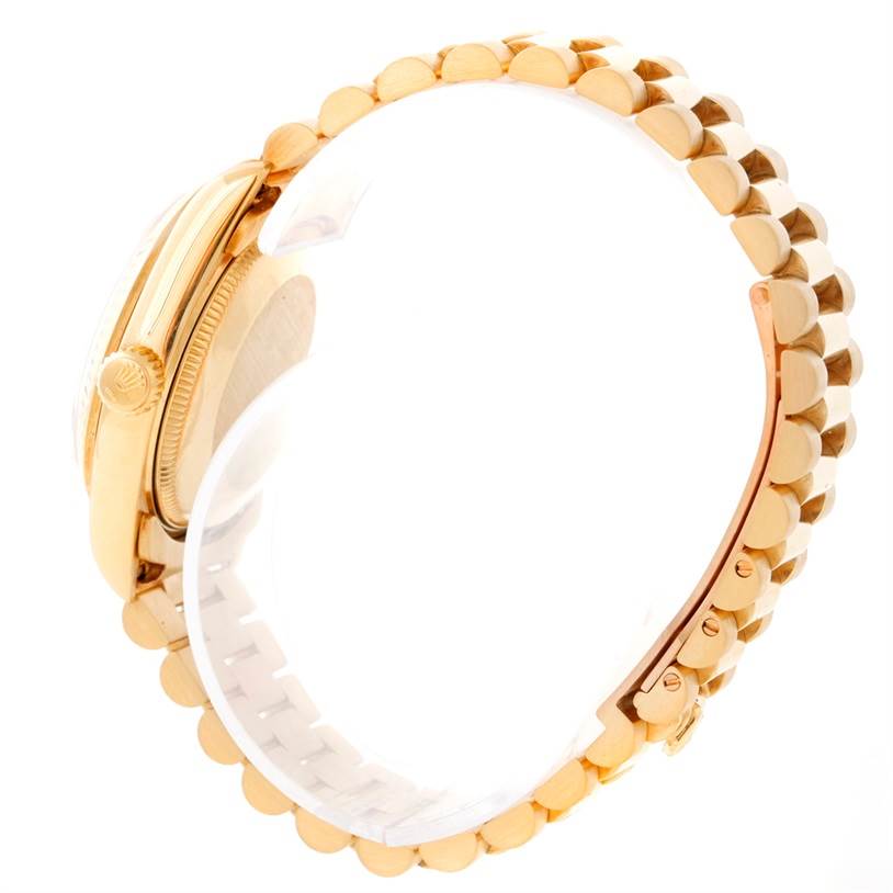 The image shows a side view of a Rolex President 68278 Women's Yellow Gold Champagne Dial 68278 Women's Yellow Gold Champagne Dial model watch, focusing on the gold case and bracelet.