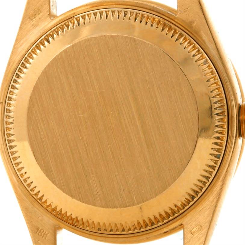 The image shows the back case of a Rolex President 69178 Women's Yellow Gold White Dial 69178 Women's Yellow Gold White Dial model watch viewed from the rear angle.