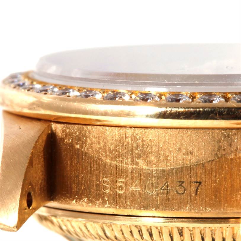 The image shows a close-up side view of the bezel and part of the case for the Rolex President 69178 Women's Yellow Gold White Dial 69178 Women's Yellow Gold White Dial model watch.