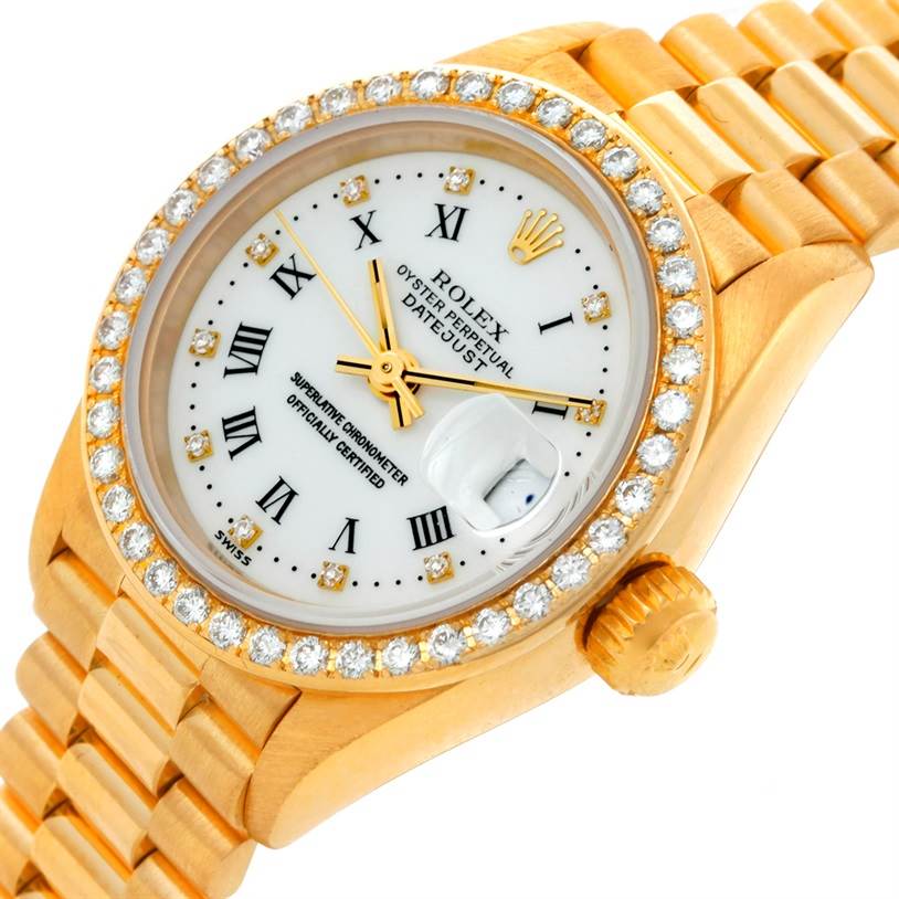 The image shows a Rolex President 69178 Women's Yellow Gold White Dial 69178 Women's Yellow Gold White Dial watch, featuring the face, bezel, and a part of the bracelet at an angled perspective.