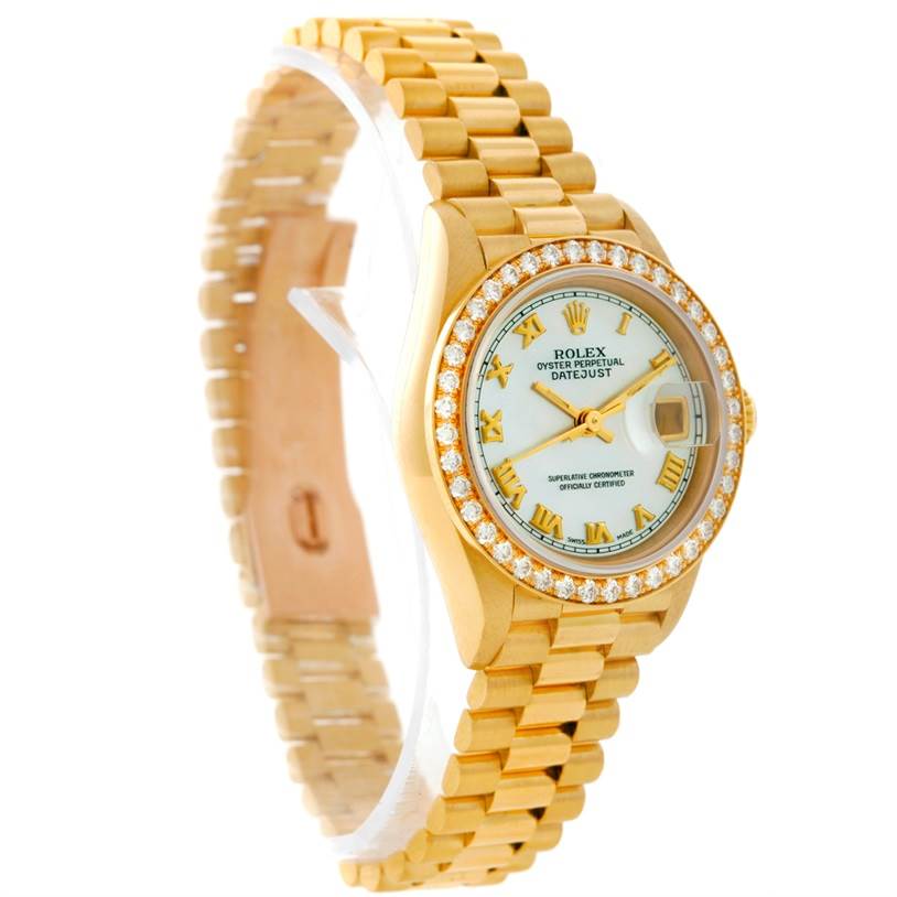 The image shows a Rolex President 69178 Women's Yellow Gold Mother of Pearl Dial 69178 Women's Yellow Gold Mother of Pearl Dial model watch at a slight angle, highlighting its gold bracelet, diamond-set bezel, and detailed dial.