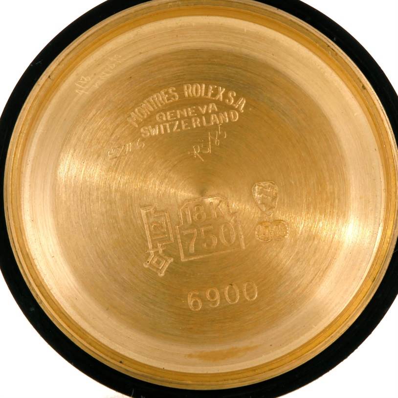 This image shows the inside case back of a Rolex President 6917 Women's Yellow Gold Champagne Dial 6917 Women's Yellow Gold Champagne Dial model, indicating its 18K gold composition and markings.