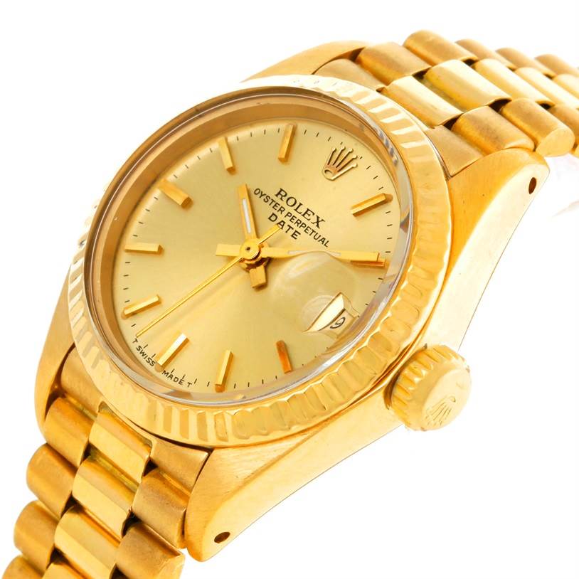 The image shows a close-up, angled view of the dial, bezel, crown, and part of the bracelet of a Rolex President 6917 Women's Yellow Gold Champagne Dial 6917 Women's Yellow Gold Champagne Dial model watch.