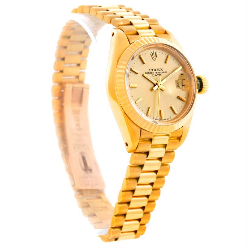 The image shows a side angle view of a Rolex President 6917 Women's Yellow Gold Champagne Dial 6917 Women's Yellow Gold Champagne Dial model wristwatch, highlighting the bracelet, case, and dial.