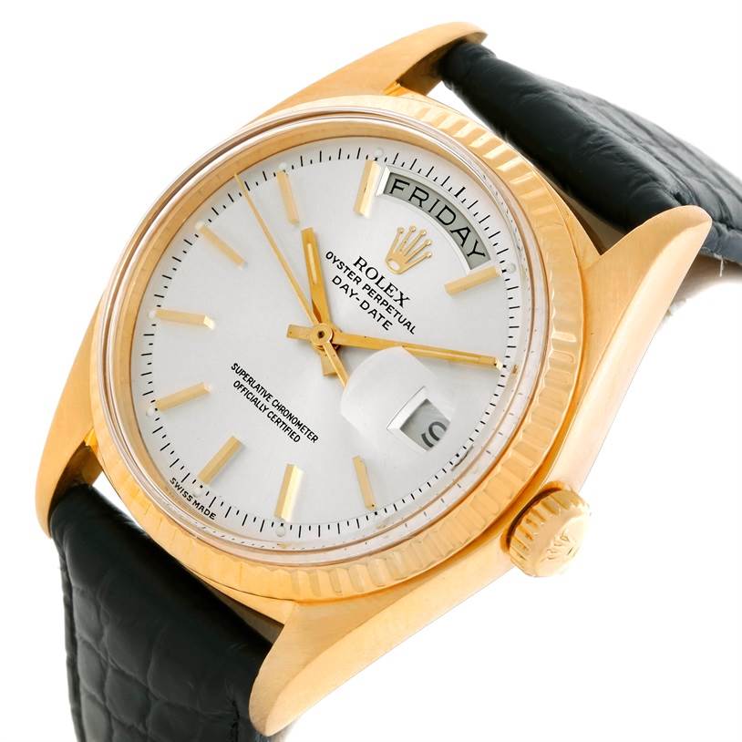 The image shows a frontal angle of the Rolex President 1803 Men
s Yellow Gold Silver Dial 1803 Men
s Yellow Gold Silver Dial model watch, featuring the dial, crown, and part of the leather strap.