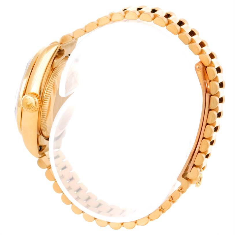 The image shows a side profile of a Rolex President 69178 Women's Yellow Gold Green Dial 69178 Women's Yellow Gold Green Dial model, displaying the case, crown, and part of the bracelet.