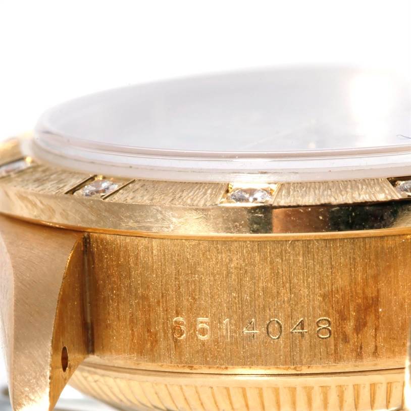 The image shows a close-up side view of a Rolex President 69288 Women's Yellow Gold White Dial 69288 Women's Yellow Gold White Dial model watch, highlighting the gold case, bezel, and diamonds.