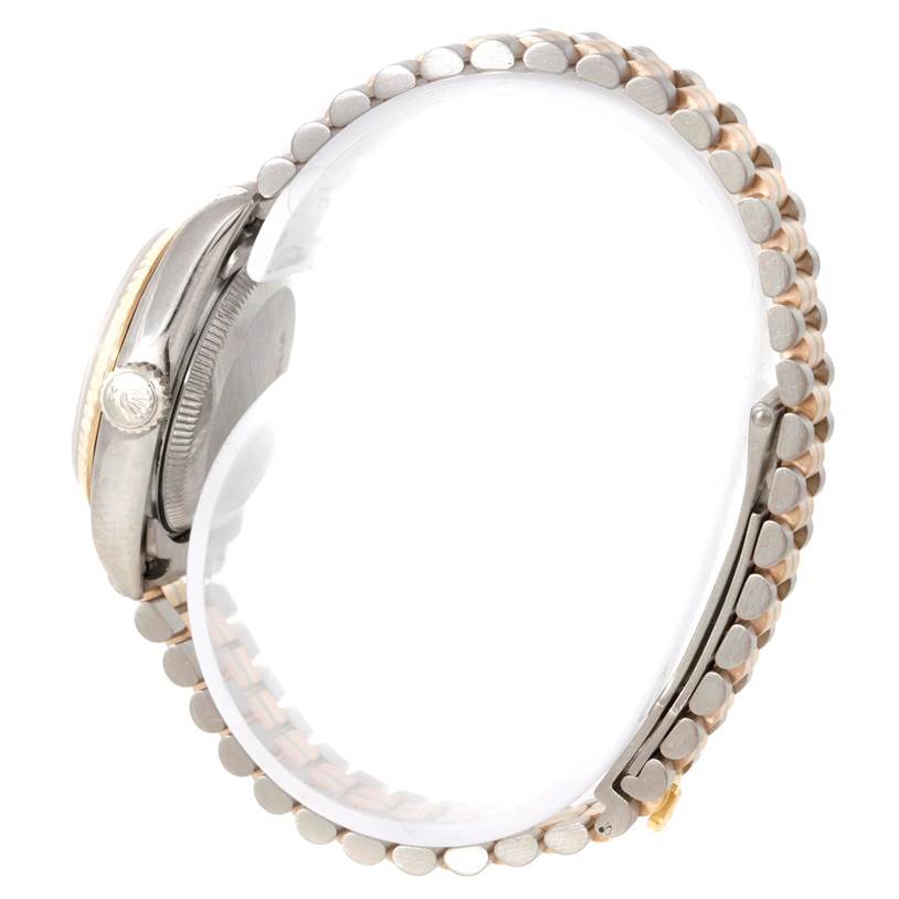 This image shows a side profile of the Rolex President 69179B Women's White Gold Brown Dial 69179B Women's White Gold Brown Dial model watch, highlighting its bezel, crown, and part of the bracelet.