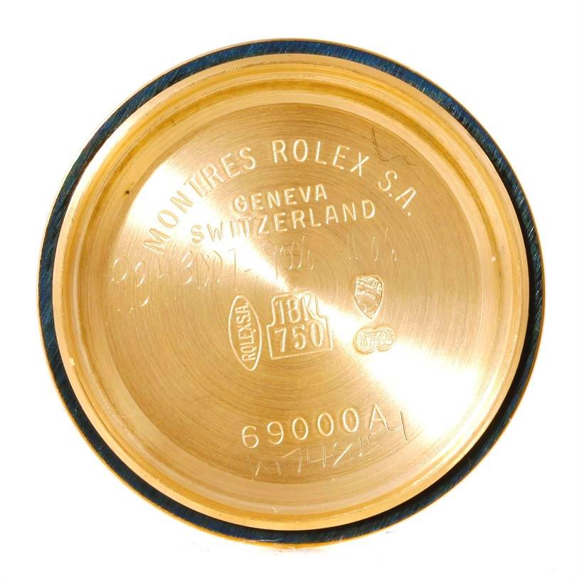 This image shows the inner case back of a Rolex President 69178 Women's Yellow Gold Champagne Dial 69178 Women's Yellow Gold Champagne Dial model watch, highlighting the engraved details and specifications.