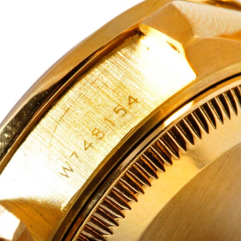 This close-up image shows the side edge, bezel, and part of the bracelet of a Rolex President 69178 Women's Yellow Gold Champagne Dial 69178 Women's Yellow Gold Champagne Dial model watch.