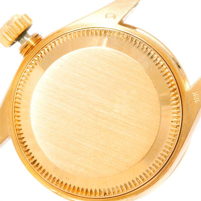 The image shows the case back and crown of a Rolex President 69178 Women's Yellow Gold Champagne Dial 69178 Women's Yellow Gold Champagne Dial model watch, viewed from the back.