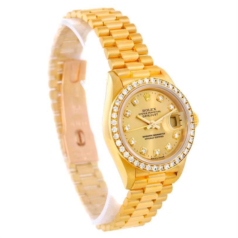 The Rolex President 69178 Women's Yellow Gold Champagne Dial 69178 Women's Yellow Gold Champagne Dial model watch is shown at an angle displaying its gold bracelet, diamond bezel, and dial.