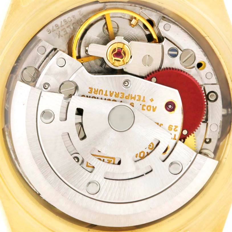 This image shows the intricate inner movement and mechanics of a Rolex President 69178 Women's Yellow Gold Black Dial 69178 Women's Yellow Gold Black Dial model watch from a close-up angle.