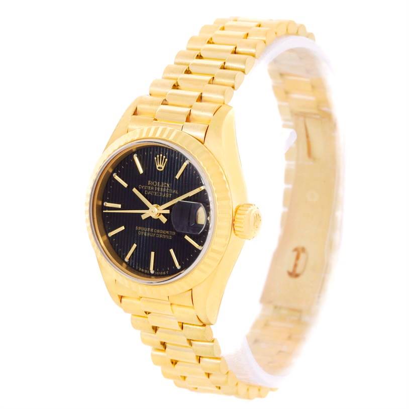 The Rolex President 69178 Women's Yellow Gold Black Dial 69178 Women's Yellow Gold Black Dial model watch is shown at an angle highlighting its black dial, gold case, and bracelet.