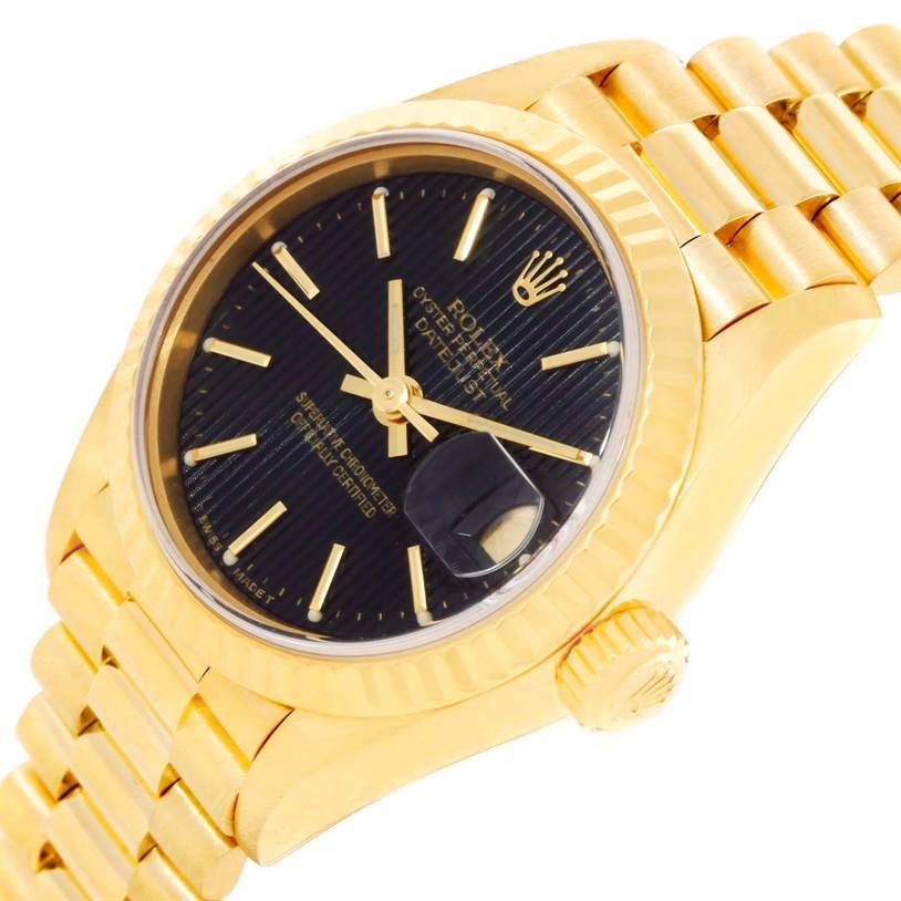 The image shows a close-up angled view of the Rolex President 69178 Women's Yellow Gold Black Dial 69178 Women's Yellow Gold Black Dial model watch, highlighting the face, bezel, and part of the bracelet.