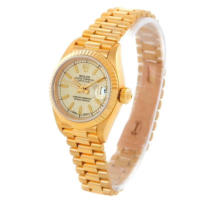 The image shows a Rolex President 69178 Women
s Yellow Gold Beige Dial 69178 Women
s Yellow Gold Beige Dial model watch, with a gold bracelet, dial, and bezel, angled from the top-right.