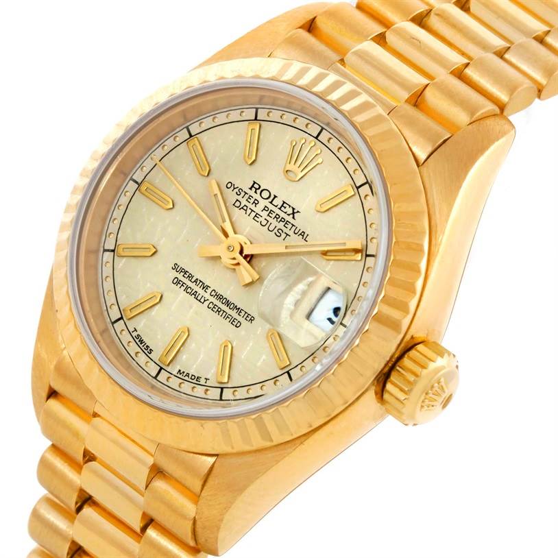 This image shows a close-up, side angle of the Rolex President 69178 Women
s Yellow Gold Beige Dial 69178 Women
s Yellow Gold Beige Dial model watch, highlighting its dial, bezel, and bracelet.