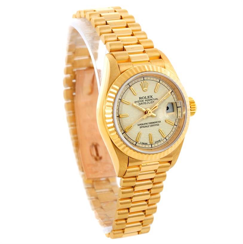 The image shows a Rolex President 69178 Women
s Yellow Gold Beige Dial 69178 Women
s Yellow Gold Beige Dial model watch angled to display its face, bezel, and bracelet.