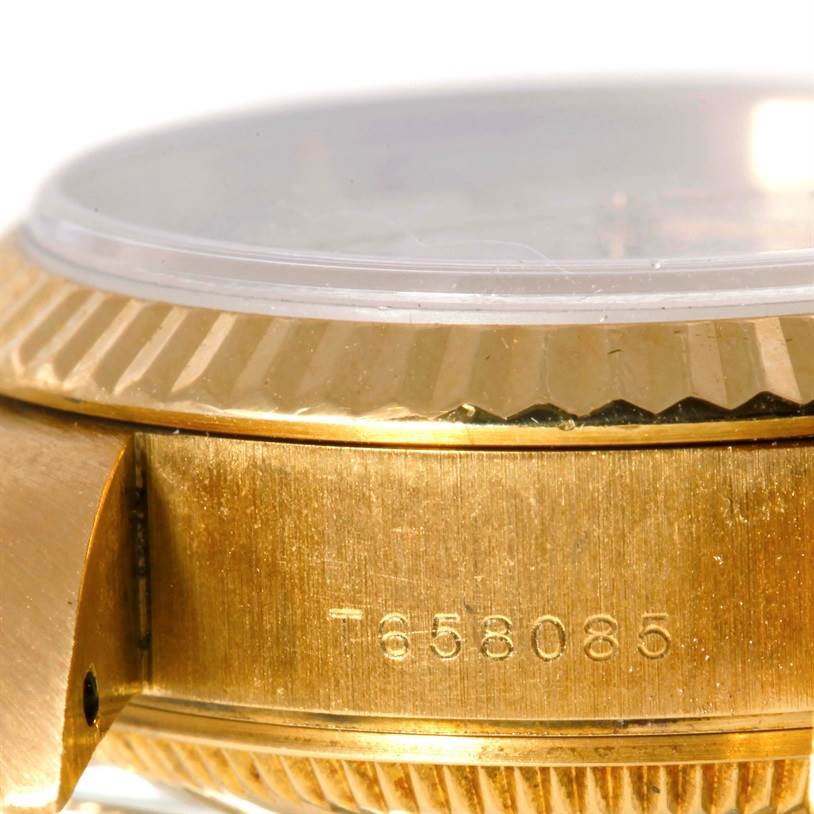 This image shows a close-up side view of the Rolex President 69178 Women
s Yellow Gold Beige Dial 69178 Women
s Yellow Gold Beige Dial model watch, highlighting the case and bezel
s gold details.