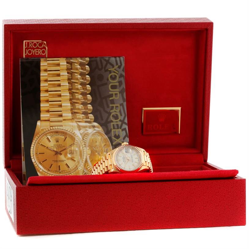 This image shows a Rolex President 69178 Women
s Yellow Gold Beige Dial 69178 Women
s Yellow Gold Beige Dial model watch angled slightly to the right, displayed in its red box with accompanying documentation.