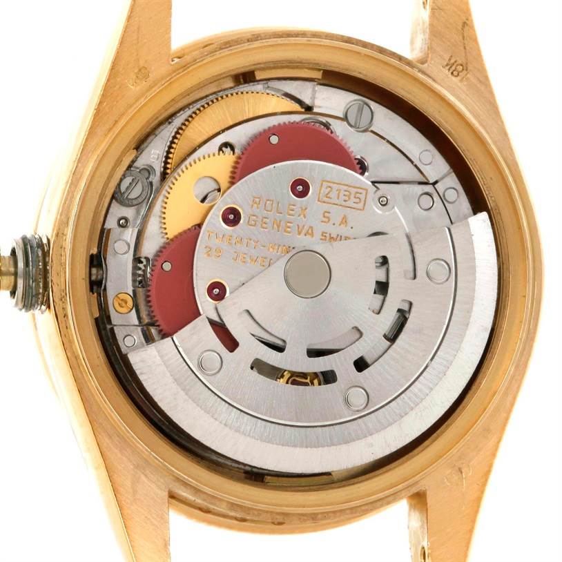 The image shows the internal mechanism (movement) of a Rolex President 69178 Women's Yellow Gold Black Dial 69178 Women's Yellow Gold Black Dial model watch from the back.