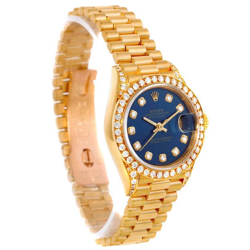 The image shows a Rolex President 69188 Women's Yellow Gold Blue Dial 69188 Women's Yellow Gold Blue Dial model watch, angled to display the face, bezel, and part of the gold bracelet band.