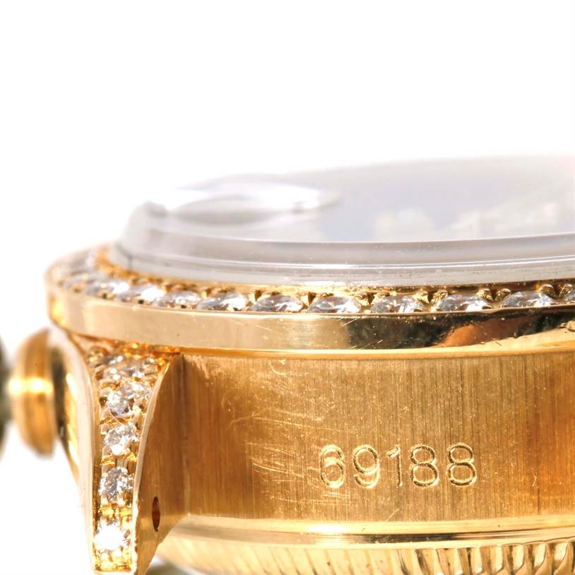 This image shows a close-up, side view of the Rolex President 69188 Women's Yellow Gold Blue Dial 69188 Women's Yellow Gold Blue Dial model watch, highlighting its gold case, diamond bezel, and model number 69188.