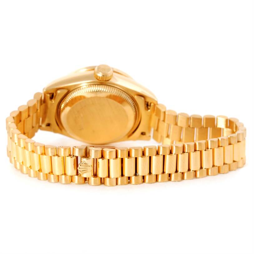 This image shows the back and bracelet of the Rolex President 69188 Women's Yellow Gold Blue Dial 69188 Women's Yellow Gold Blue Dial model watch.