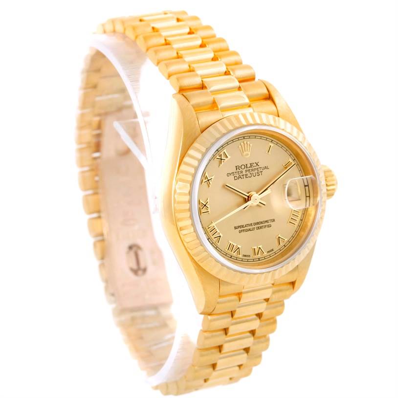 The image shows a gold Rolex President 69178 Women's Yellow Gold Champagne Dial 69178 Women's Yellow Gold Champagne Dial Datejust watch, with a clear view of its face and bracelet from a side angle.