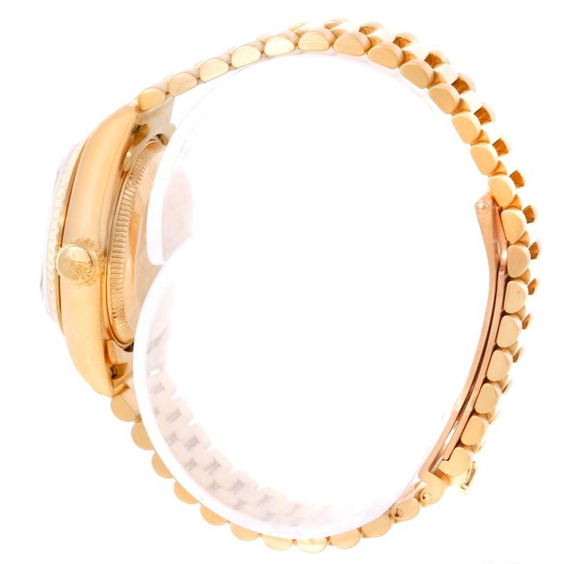 The image shows a side view of a Rolex President 69178 Women's Yellow Gold Champagne Dial 69178 Women's Yellow Gold Champagne Dial model watch, displaying the case and part of the gold bracelet.