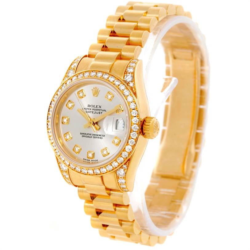 The image shows a Rolex President 179298 Women's Yellow Gold Silver Dial 179298 Women's Yellow Gold Silver Dial model watch, angled to display the diamond-studded bezel, dial, and gold bracelet.