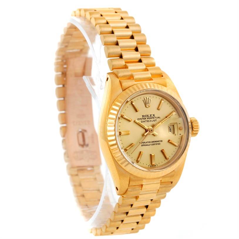 The Rolex President 6917 Women's Yellow Gold Champagne Dial 6917 Women's Yellow Gold Champagne Dial model watch is shown at an angle displaying the face, bezel, crown, and part of the bracelet.