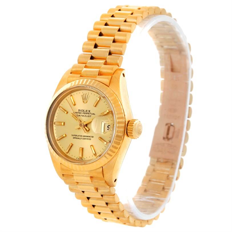 The Rolex President 6917 Women's Yellow Gold Champagne Dial 6917 Women's Yellow Gold Champagne Dial model watch is shown at an angled side view, displaying its dial, crown, and bracelet.