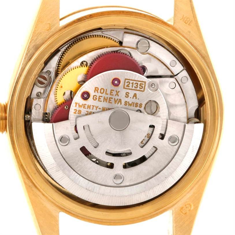 This is an interior view of the Rolex President 69178 Women's Yellow Gold Champagne Dial 69178 Women's Yellow Gold Champagne Dial model, showing its intricate movement and components.