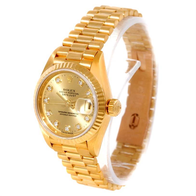 This Rolex President 69178 Women's Yellow Gold Champagne Dial 69178 Women's Yellow Gold Champagne Dial model watch is shown at a slight angle, displaying its gold bracelet, bezel, dial, crown, and date window.