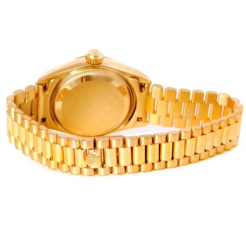 The image shows the back case and bracelet of a Rolex President 69178 Women's Yellow Gold Champagne Dial 69178 Women's Yellow Gold Champagne Dial model watch, viewed from an angled rear perspective.