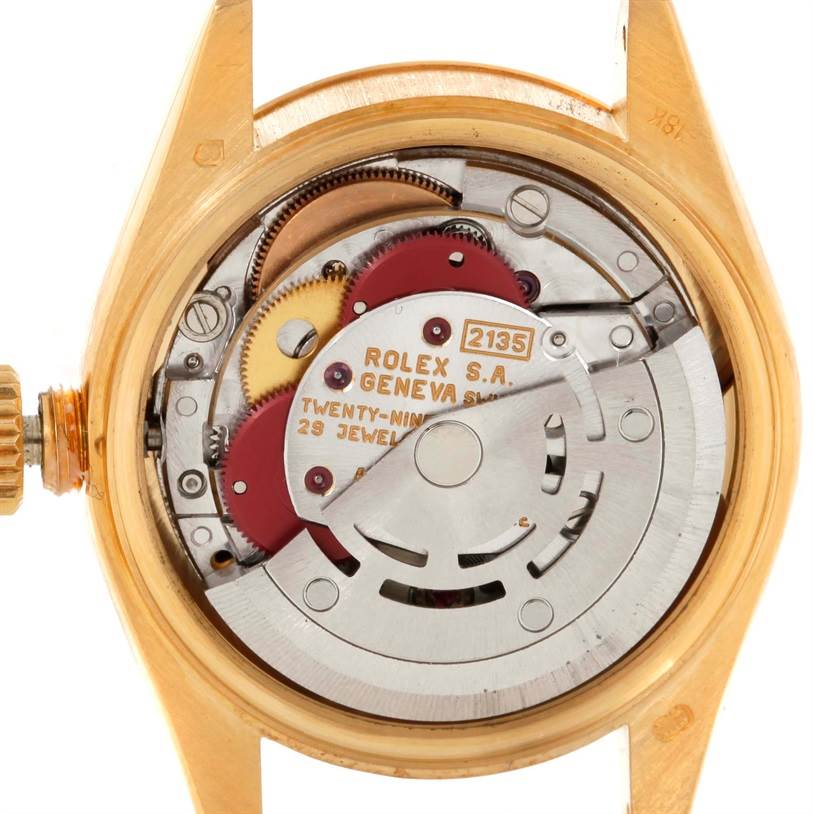 This image shows the internal movement components of a Rolex President 69178 Women's Yellow Gold Silver Dial 69178 Women's Yellow Gold Silver Dial model watch from a rear view angle.
