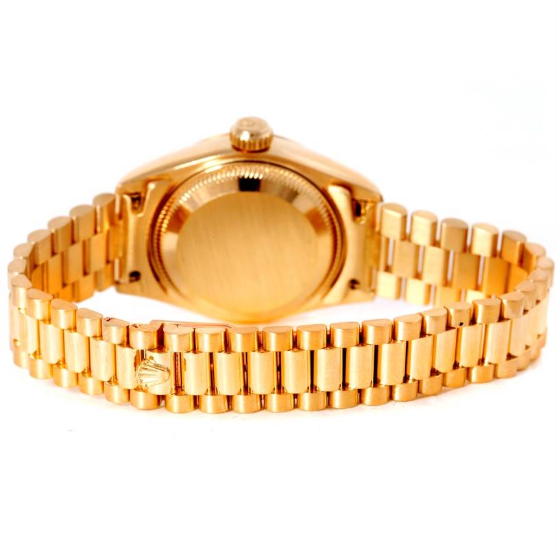 This image shows the back case and bracelet of a Rolex President 69178 Women's Yellow Gold Silver Dial 69178 Women's Yellow Gold Silver Dial model watch from a rear angle.